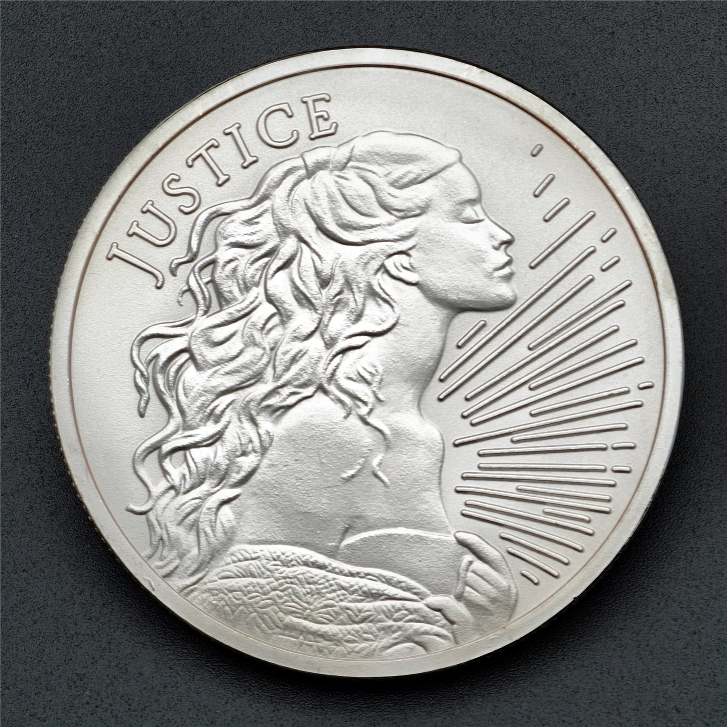 1 oz Justice Silver Shield Round (New)