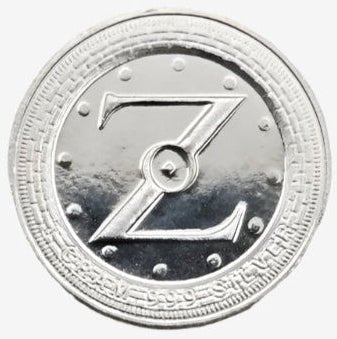 Silver coin with a central emblem on a white background